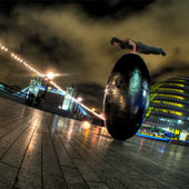 Man Balances on Giant Egg